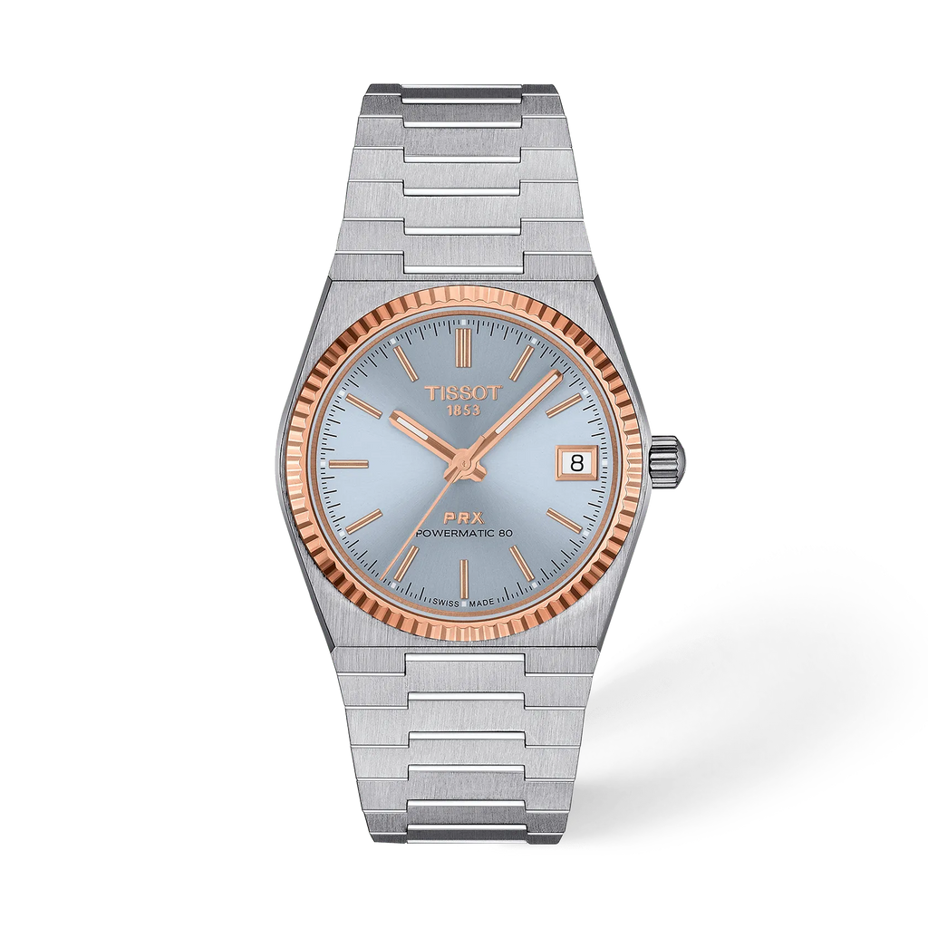 Front view of the watch Tissot PRX Gold 35mm with shadow