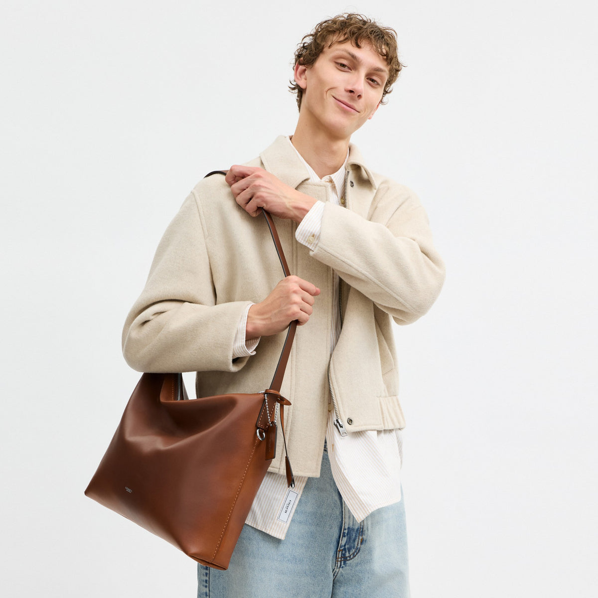 Coach Mott Messenger Bag 38 In Loved Leather - Saddle/Burnt Sienna
