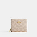 Coach Snap Wallet In Signature Canvas - Gold/Sand/Chalk (Women's)