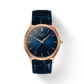 Front view of the watch Tissot Excellence 18K Gold with shadow